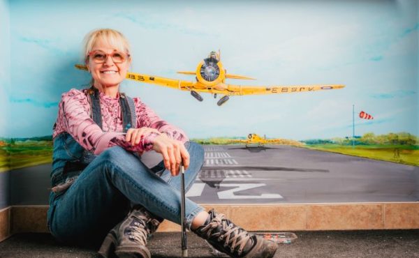 Stella Jurgen hand-painted a Harvard taking off from the runway in front of the Skyway Café in the Tillsonburg Regional Airport lounge.